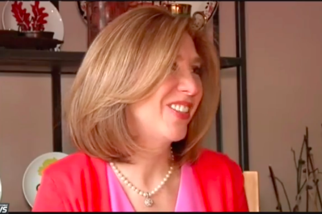 Laurie Berzack appearing on TV news